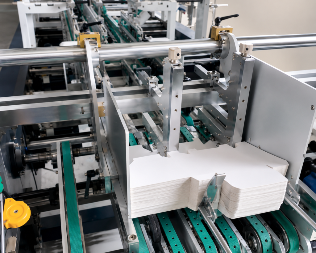 High speed folding box production