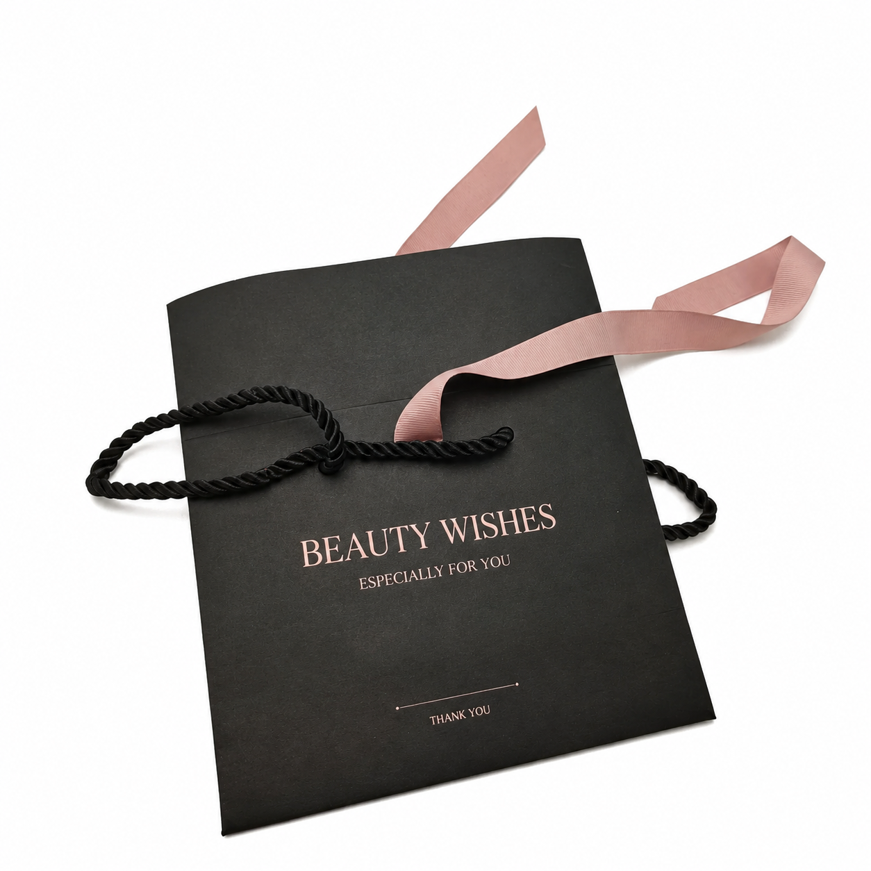 Black luxury gift bag with metallic gold foil logo finishing