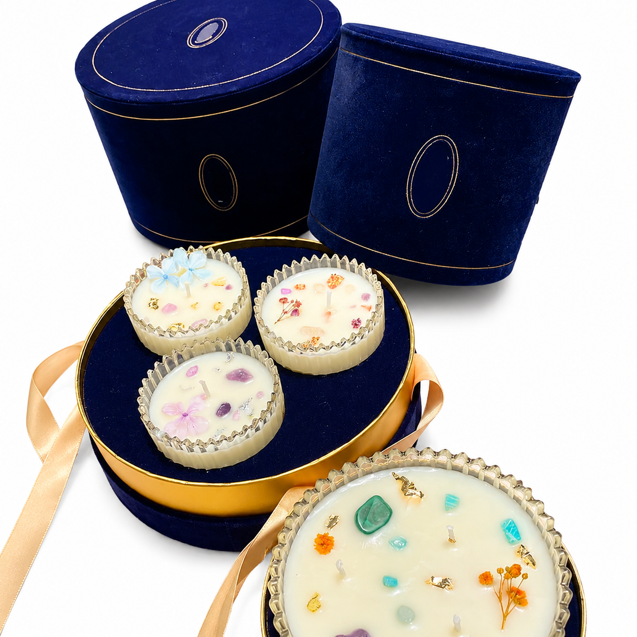 Luxury velvet round candle gift box with three candles and gold inner edge detail